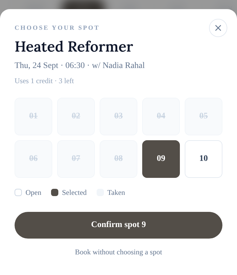 The spot picker for a reformer class: ten reformers, eight taken, spot 9 selected.