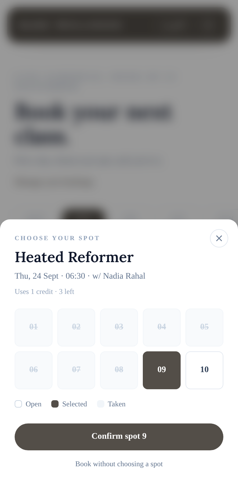 Choosing a spot on the portal: reformers 1 to 10 for the 06:30 Heated Reformer class, spot 9 selected and a Confirm spot 9 button.